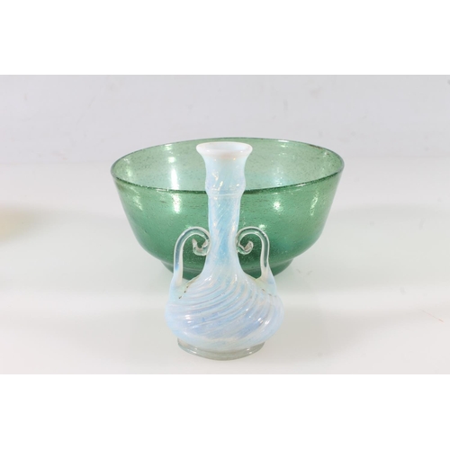 477 - Four pieces of glass to include an opalescent glass squat baluster vase with flaring rim and scroll ... 