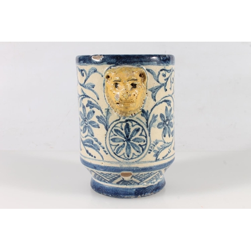 478 - Antique blue and white earthenware albarello, with two lion mask handles, 14.5cm.