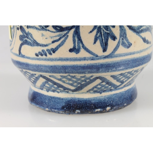 478 - Antique blue and white earthenware albarello, with two lion mask handles, 14.5cm.