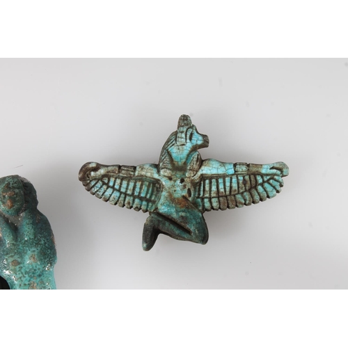 486 - Egyptian faience style winged goddess, 7.5cm long, two bangles, a small ushabti figure (af), four sc... 