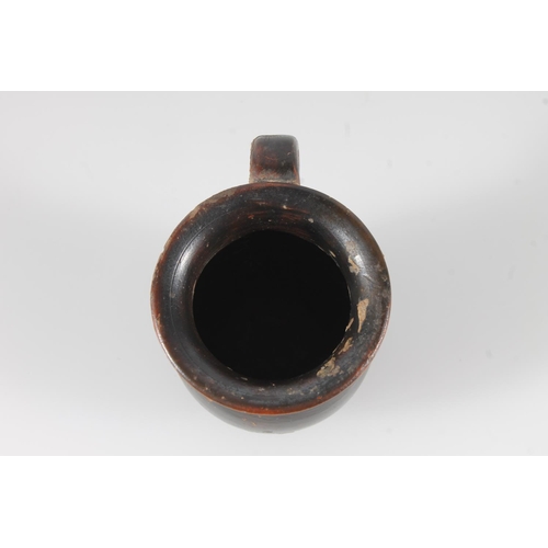 488 - Greek Apulian black glazed jug, 6.5cm tall.