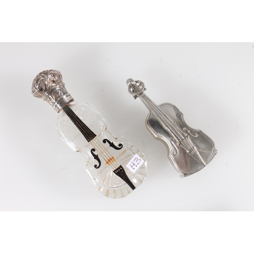 490 - Glass scent bottle in the form of a cello with silver top, 8cm tall, a white metal vesta case in the... 