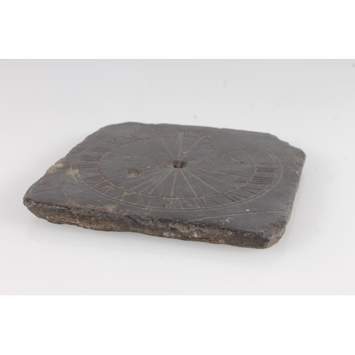 491 - Georgian slate sun dial, incised with makers initials 'IG' and dated 1717, 12.5cm wide.