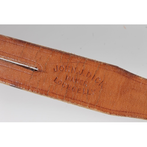 501 - Dick of Lochgelly leather two tail tawse stamped 'John J Dick Maker Lochgelly', 53cm long.