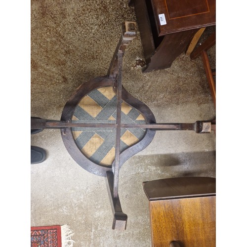 603 - Mahogany inlaid tub chair in floral upholstery 