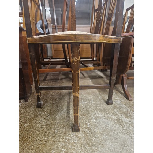 603 - Mahogany inlaid tub chair in floral upholstery 