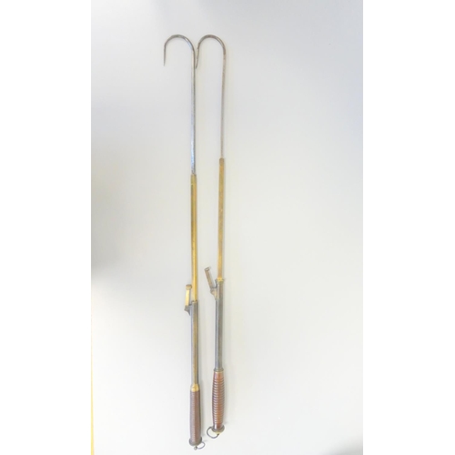 383 - Two antique 19th century telescopic salmon gaffs with brass shafts, extending steel hooks and with r... 