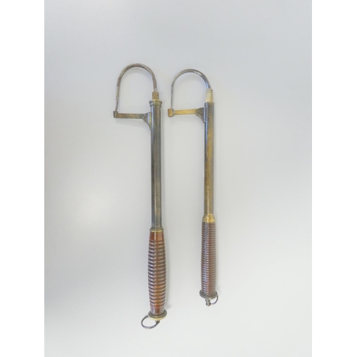 383 - Two antique 19th century telescopic salmon gaffs with brass shafts, extending steel hooks and with r... 