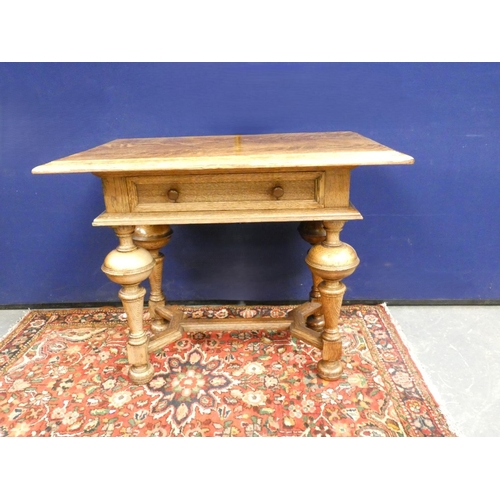 413 - Jacobean revival oak occasional table with three plank top above single drawer and rasied on turned ... 