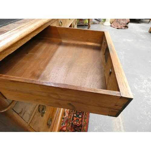 414 - Victorian walnut veneered pedestal desk with tooled leather top, the large drawer with ring handles,... 