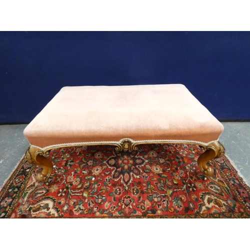 419 - Victorian style walnut large stool upholstered in pink and raised on cabriole supports. Height 40cm.