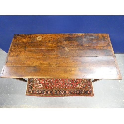 426 - 18th century oak five plank country table raised on square tapered supports, united by a 'H' stretch... 