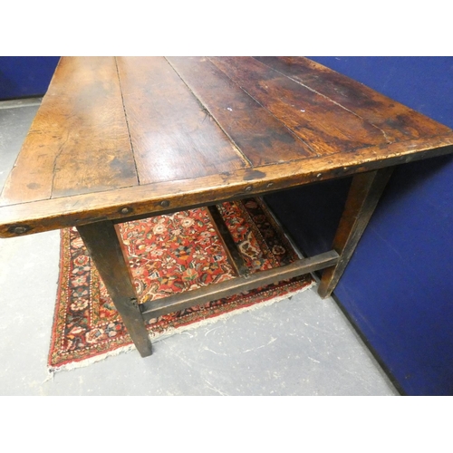 426 - 18th century oak five plank country table raised on square tapered supports, united by a 'H' stretch... 