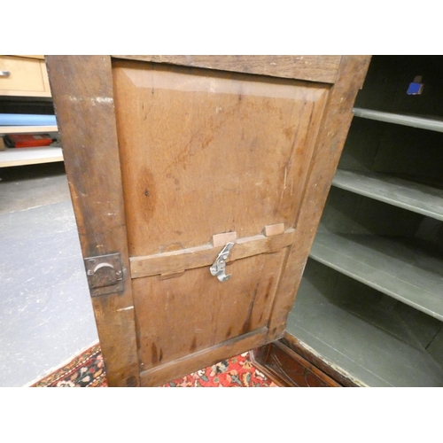 427 - 18th century oak corner cupboard, the carved panel door enclosing three shelves. Height 105cm, Width... 