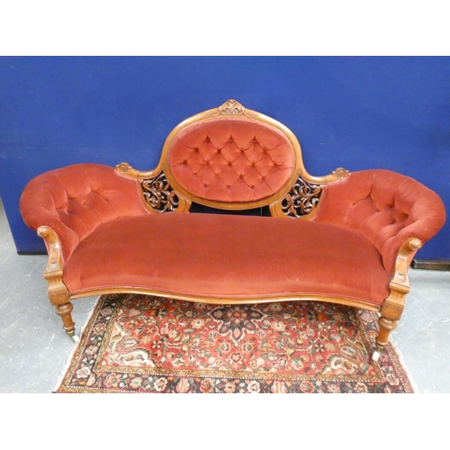 433 - 19th Century Victorian mahogany upholstered parlour sofa with button pad back, pierced fret scrolled... 