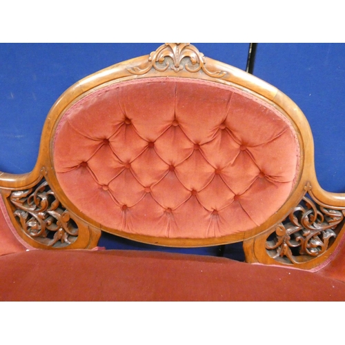 433 - 19th Century Victorian mahogany upholstered parlour sofa with button pad back, pierced fret scrolled... 