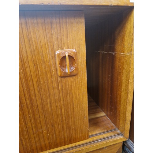 639 - Mid-century teak t.v. unit, H 48cm, W 121cm, D 40cm