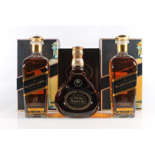 1084 - JOHNNIE WALKER Swing Superior blended Scotch whisky 43% abv. 70cl boxed, and two bottles JOHNNIE WAL... 