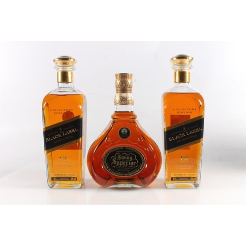 1084 - JOHNNIE WALKER Swing Superior blended Scotch whisky 43% abv. 70cl boxed, and two bottles JOHNNIE WAL... 