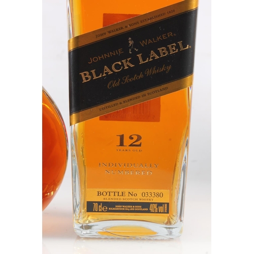 1084 - JOHNNIE WALKER Swing Superior blended Scotch whisky 43% abv. 70cl boxed, and two bottles JOHNNIE WAL... 