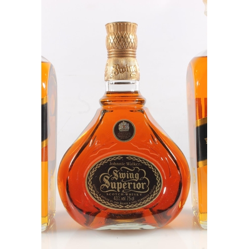 1084 - JOHNNIE WALKER Swing Superior blended Scotch whisky 43% abv. 70cl boxed, and two bottles JOHNNIE WAL... 