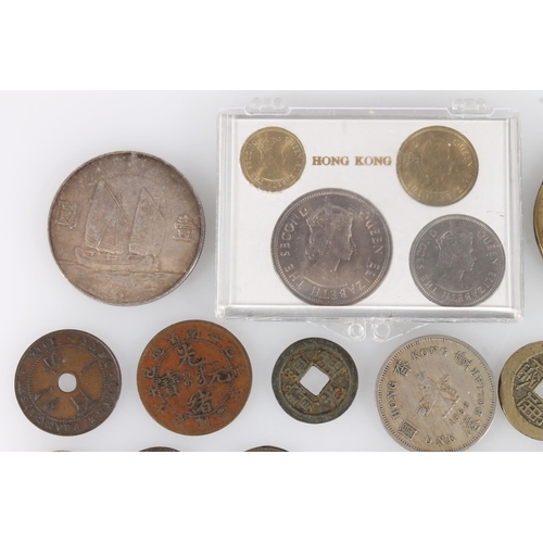 1251 - Asian coins to include:REPUBLIC OF CHINA silver ‘Junk’ dollar. Chinese cash coins. JAPAN 20 sen 1895... 