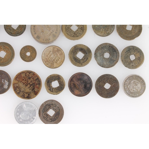 1251 - Asian coins to include:REPUBLIC OF CHINA silver ‘Junk’ dollar. Chinese cash coins. JAPAN 20 sen 1895... 