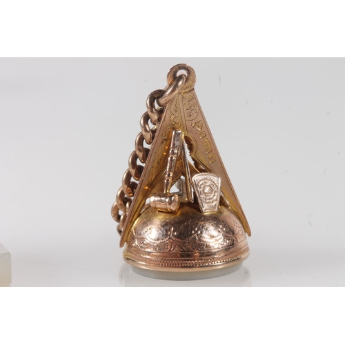 1345 - 9ct gold mounted Masonic fob decorated with Masonic symbols including square, trowel, tablet and gav... 