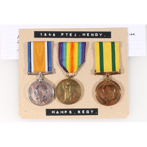 1406 - Medals of 203252/1646 Private J Hendy of the Hampshire Regiment comprising WWI war medal and victory... 