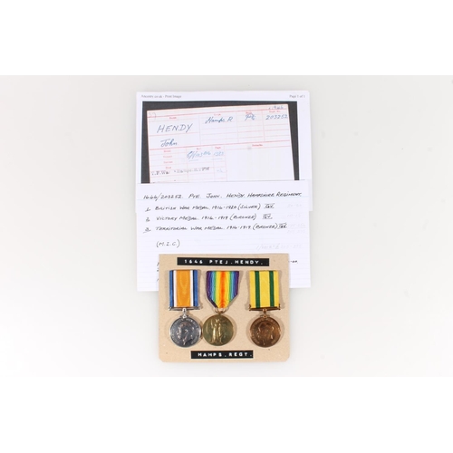 1406 - Medals of 203252/1646 Private J Hendy of the Hampshire Regiment comprising WWI war medal and victory... 