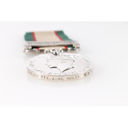 1411 - Medal of 2977940 Private J McNulty of the 2nd Battalion Argyll and Sutherland Highlanders comprising... 