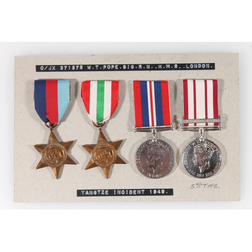 1412 - Medals of C/JX 371575 Signaller William T Pope of the Royal Navy, served on HMS London comprising Ge... 