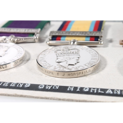 1414 - Medals of Lance Corporal T J Horsfield of the Queens Own Highlanders comprising Elizabeth II General... 