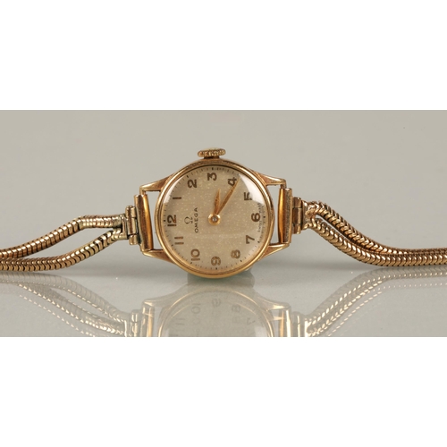 118 - Ladies Omega 9ct yellow gold wrist watch on a 9ct gold bracelet strap, 16g