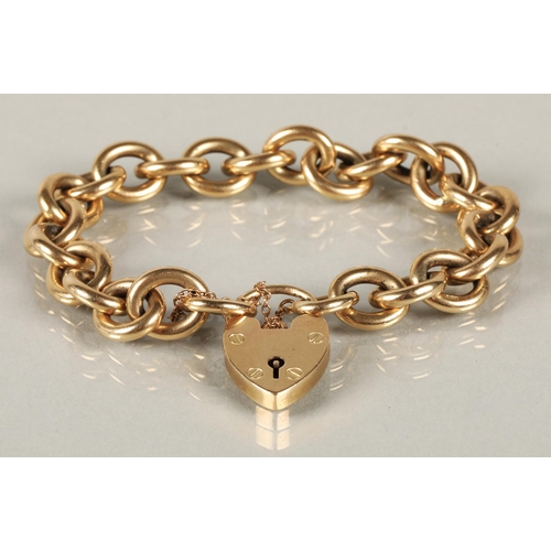 68 - Ladies 9ct yellow gold cable pattern bracelet with padlock clasp, 53.5g.