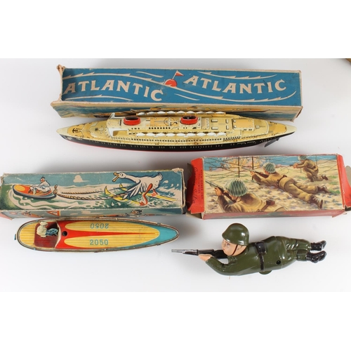 1037 - Vintage friction and clockwork toys to include Arnold Spielwaren Piccolo helicopter, CKo of US Zone ... 