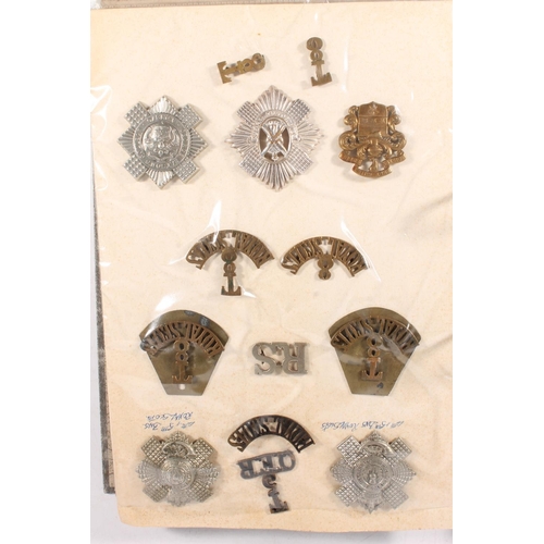 1431 - Ring binder folder containing Royal Scots insignia to include cap badges, buttons, collar badges, sh... 