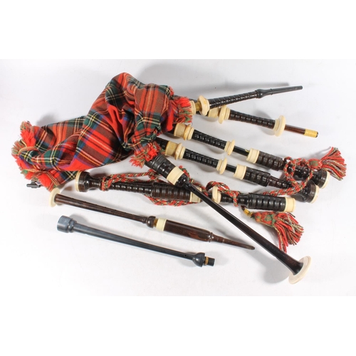 1453 - R G Lawrie of Glasgow, Edinburgh and London, a set of ivory mounted bagpipes and matching practise c... 