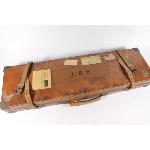 1456 - Brown leather clad gun case bearing the initials 'JBH' for John Buchan Hall of Galashiels, the case ... 