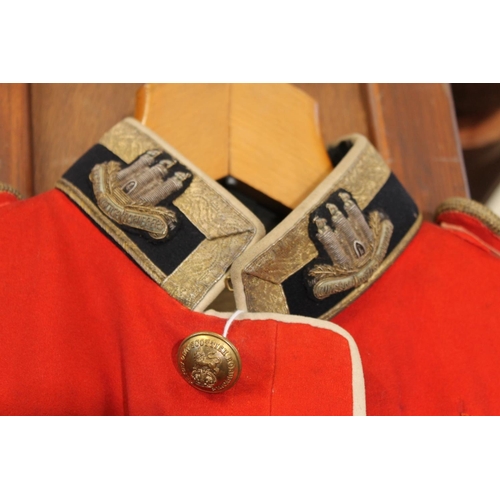 1457 - British army uniform, a red doublet jacket penned to the interior 'G E HUDSON', having Jennens and C... 