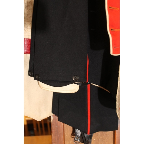 1458 - British army uniform, a red doublet jacket having W Jones & Co of London white metal Kings Own S... 