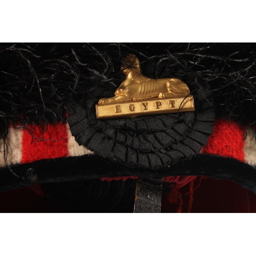 1462 - Pipers feather bonnet with Egypt cap badge, by Marshall and Aitken of Edinburgh with plume, held in ... 