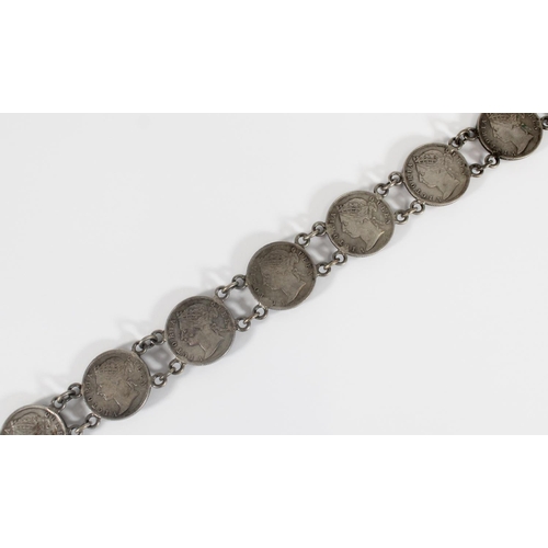 1218 - STRAITS SETTLEMENTS, a coin art belt made from twenty Queen Victoria Straits Settlements coins to in... 