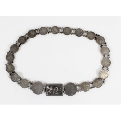 1218 - STRAITS SETTLEMENTS, a coin art belt made from twenty Queen Victoria Straits Settlements coins to in... 