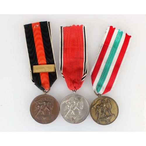 1438 - Nazi German WWII occupation medals to include Sudetenland Medal 1938 with Prague clasp, The Return o... 