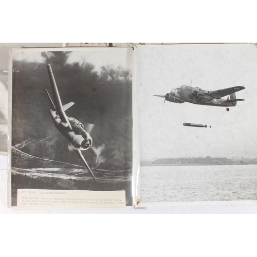 1183 - Press photographs of to include The Vultee Vengeance dive bomber, On the Flight deck of HMS Victorio... 