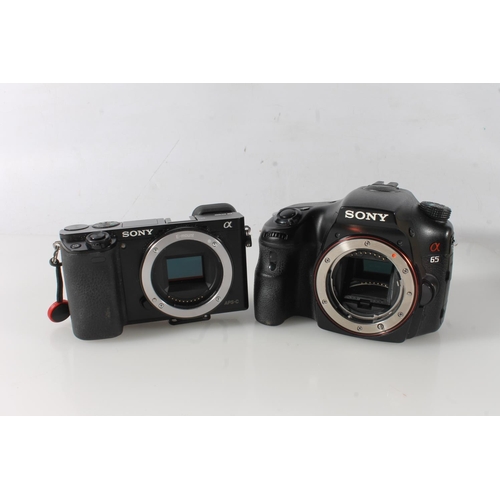 1120 - Sony Alpha 65 (A65) HD AVCHD digital camera, model number SLT-A65V, serial number 5700630, also a So... 