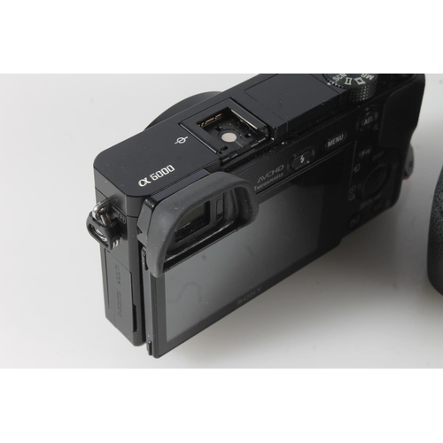 1120 - Sony Alpha 65 (A65) HD AVCHD digital camera, model number SLT-A65V, serial number 5700630, also a So... 