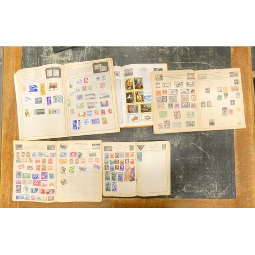 105 - Various vintage stamp albums with world stamps.