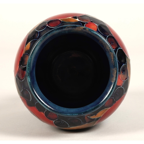 9 - Moorcroft pottery vase of baluster form, pomegranate pattern, blue signature to base, 15cm high.